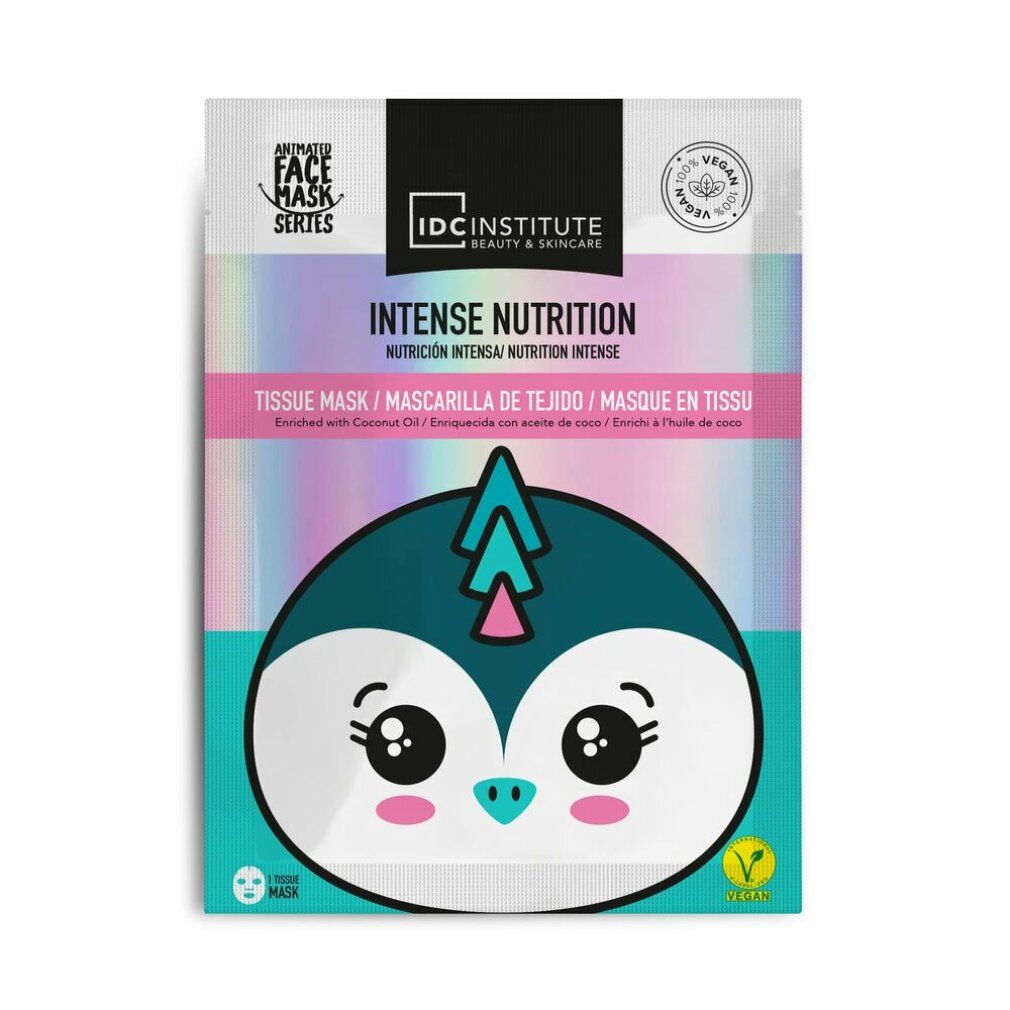 Gesichtsmaske mit Pinguin-Design. Verpackung mit Aufschrift 'Intense Nutrition' und 'Vegan'.