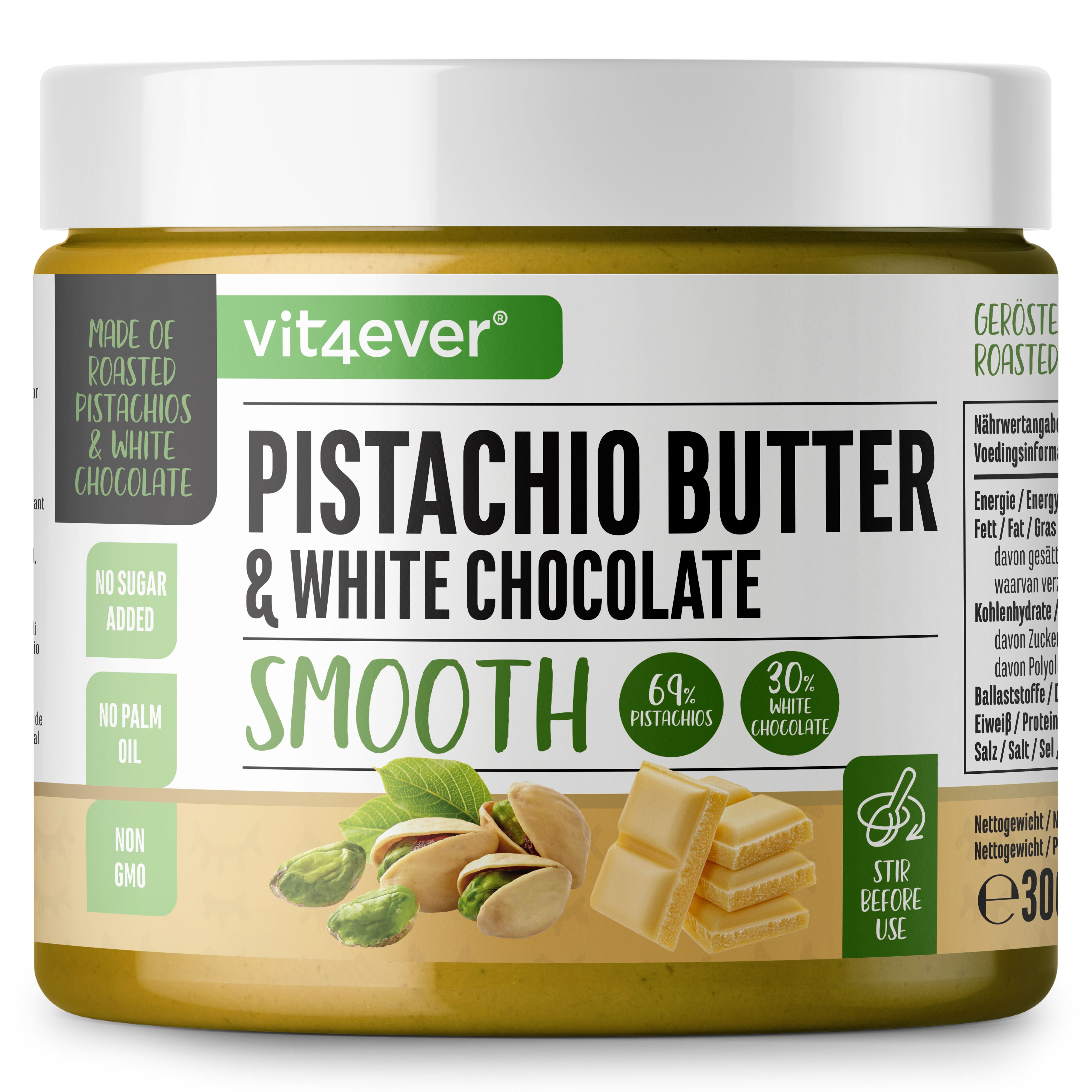 Glas Pistazien-Creme mit weißer Schokolade. Aufschrift: Pistachio Butter & White Chocolate. Pistazien, Schokoladenstücke und grüne Blätter.