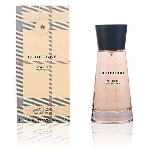 Burberry Touch Flakon mit schwarzem Deckel und Verpackung. Hellrosa Flüssigkeit. Aufschrift Burberry Touch.
