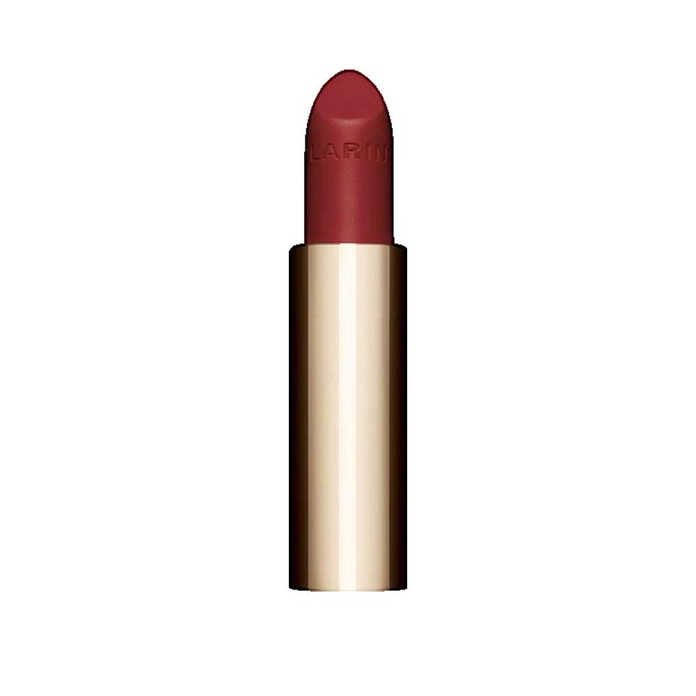 Lippenstift mit goldfarbener Hülse. Der Lippenstift ist in einem dunklen Rotton gehalten. Der Markenname ist auf dem Lippenstift sichtbar.