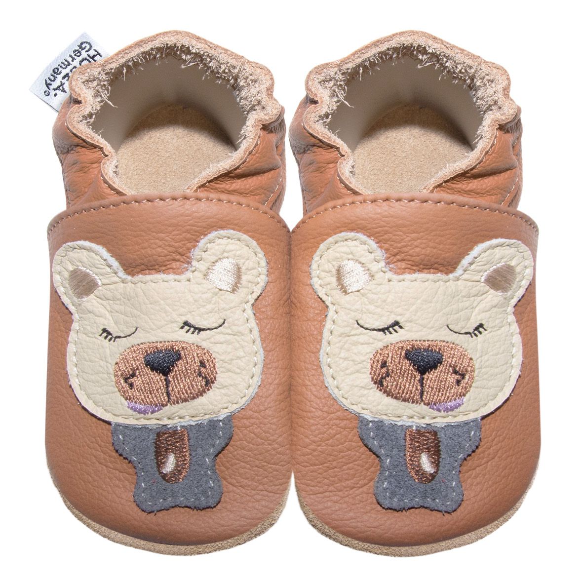 Braune Babyschuhe mit Bärenmotiv. Hellbraunes Leder, applizierter Bär mit geschlossen Augen. Marke HOBEA-Germany.
