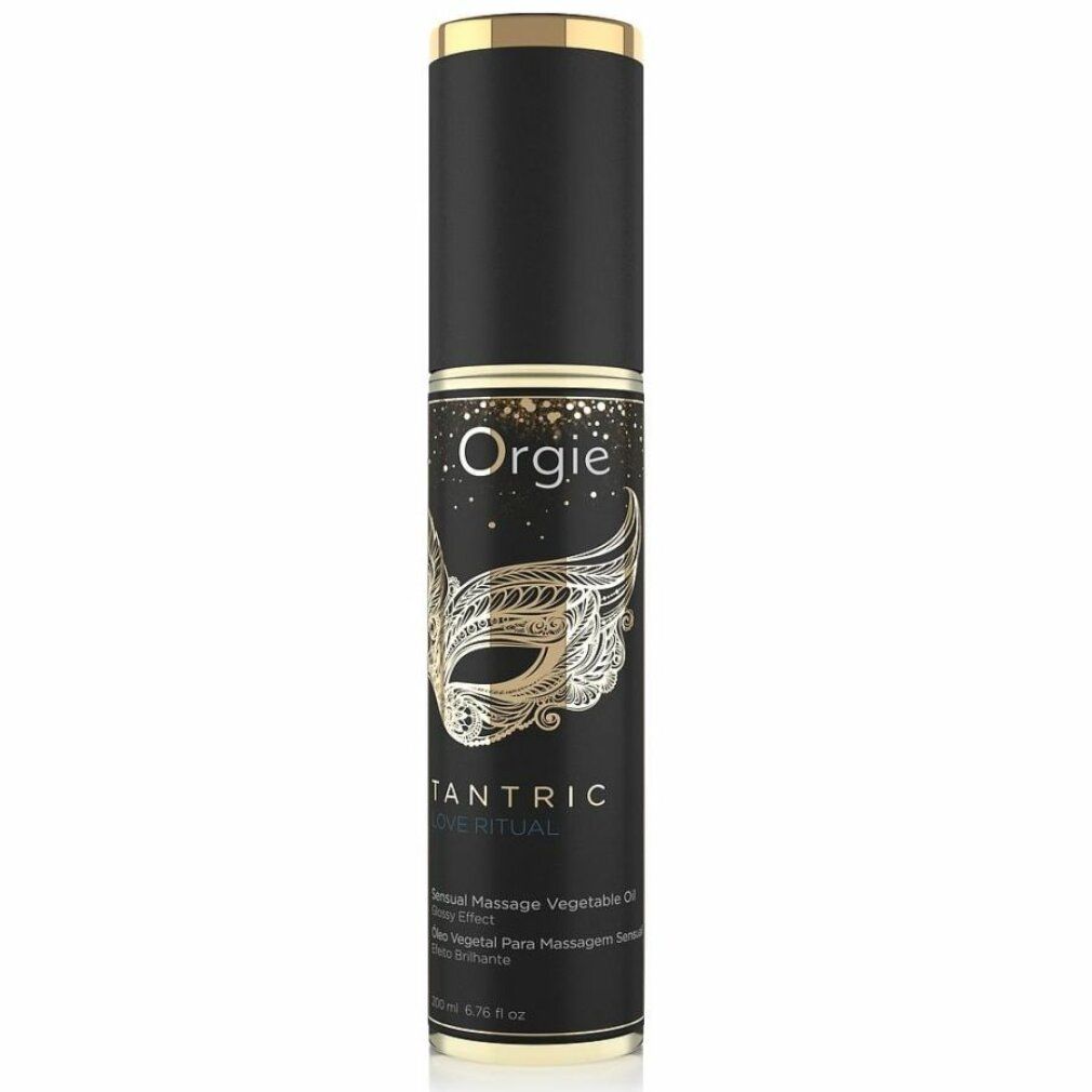 Zylindrische Flasche mit schwarzem Deckel und Etikett. Auf dem Etikett steht "Orgie", "Tantric Love Ritual" und ein Masken-Design.