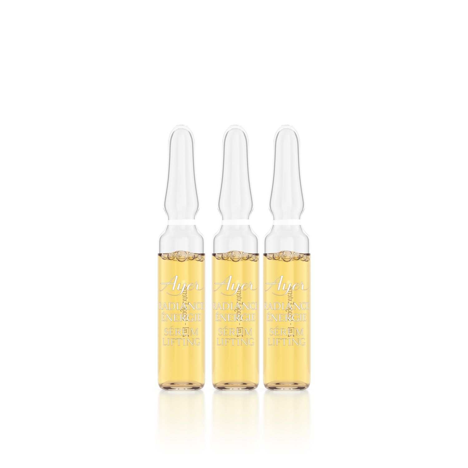 Drei Glasampullen mit gelblicher Flüssigkeit. Aufschrift Ayer Radiance Energy Lifting Serum.