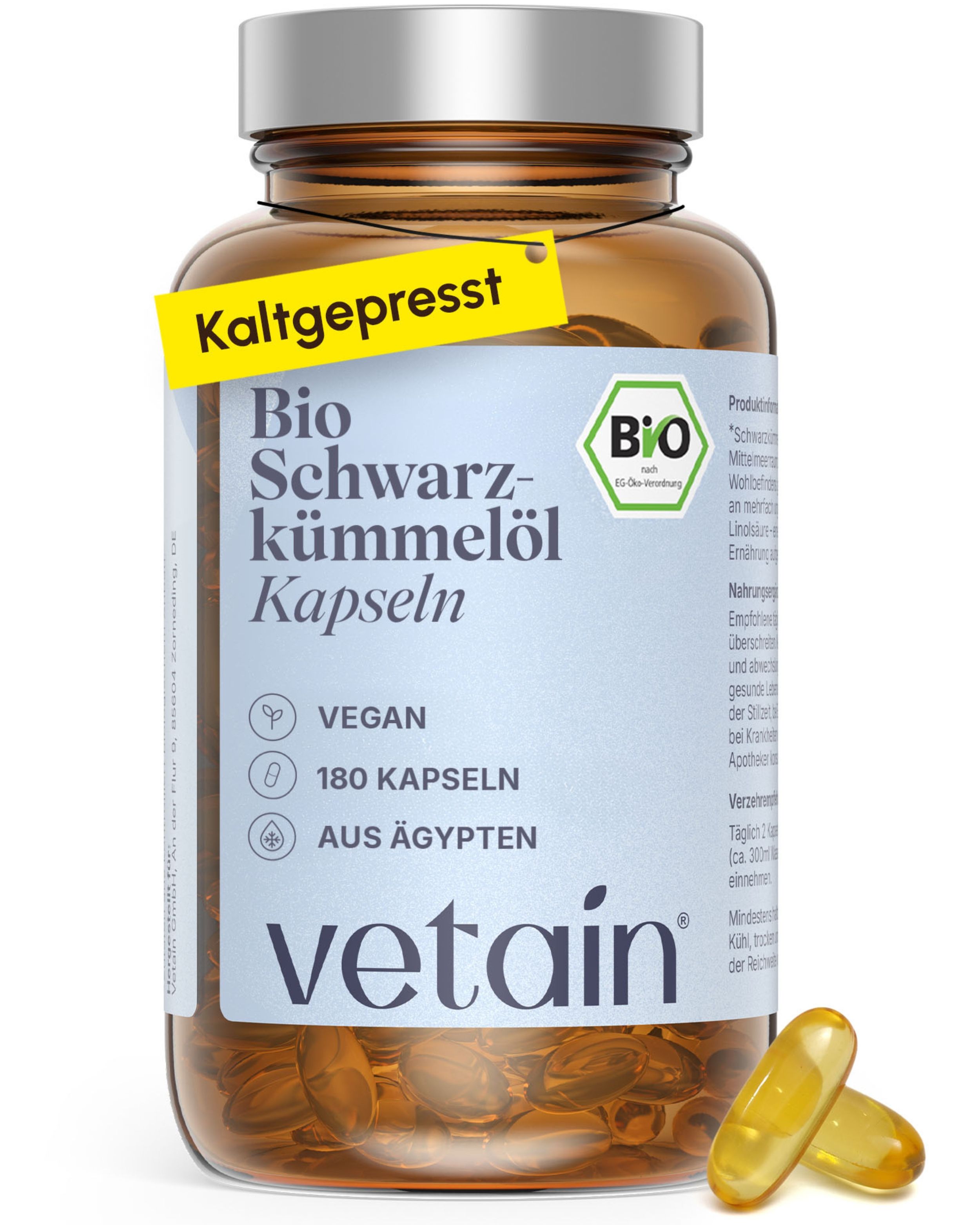 Braune Glasflasche mit VETAIN Bio Schwarzkümmelöl Kapseln, Etikett mit BIO-Siegel und gelbem Anhänger.