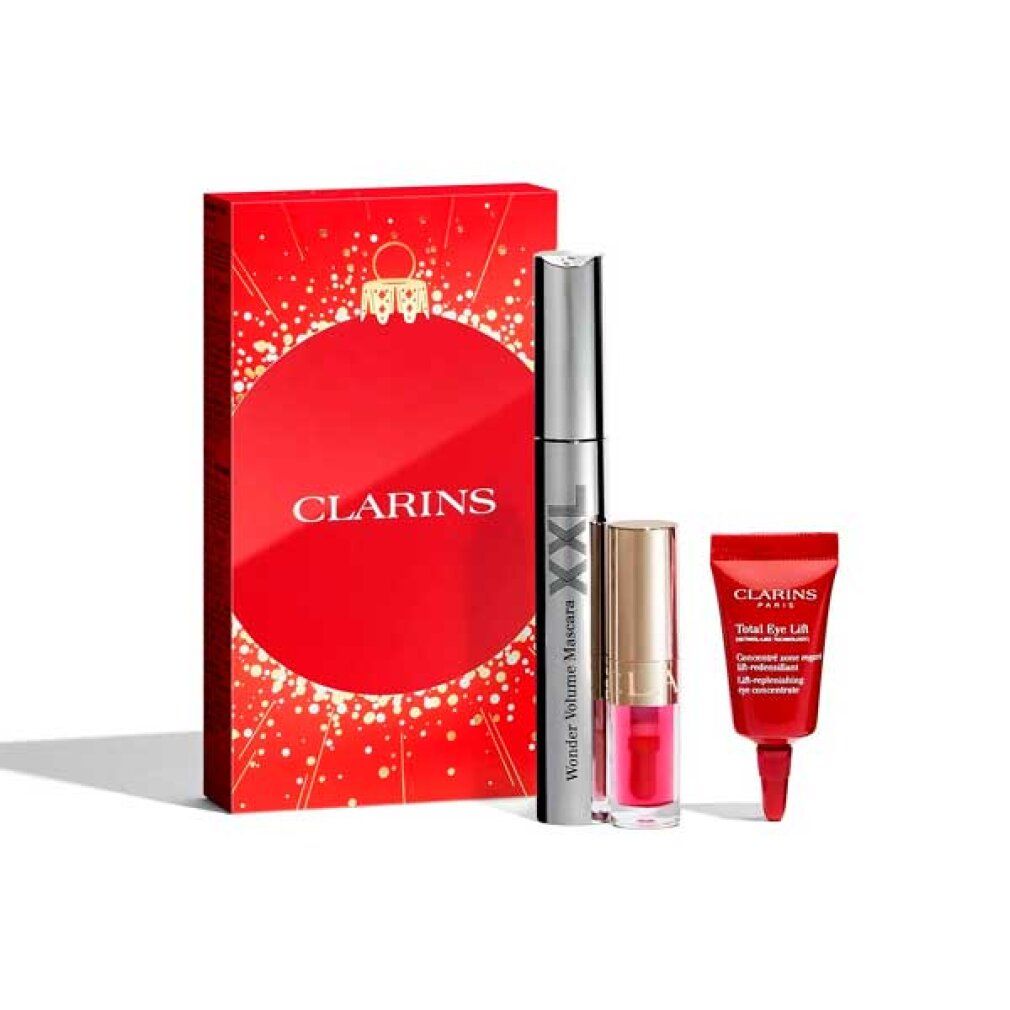 Rotes Geschenkset mit Mascara, Lipgloss und Augenpflege. Clarins-Logo auf der Verpackung und Mascara.