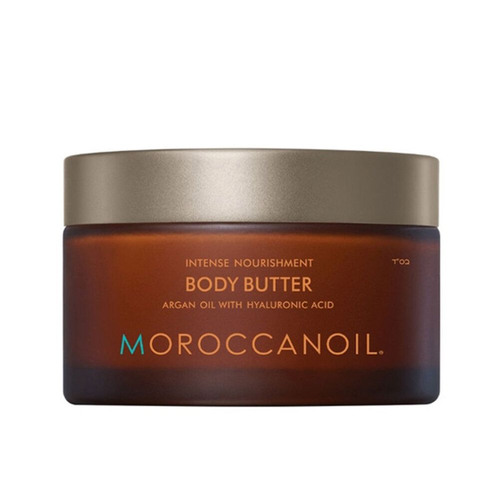 Braune Dose mit goldfarbenem Deckel. Aufschrift: Body Butter, Arganöl mit Hyaluronsäure. Marke: Moroccanoil.