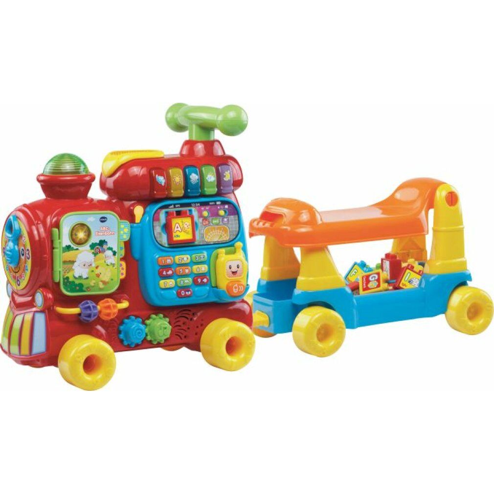 Rote und blaue VTech ABC-Eisenbahn mit Anhänger. Der Anhänger hat blaue Räder und orangefarbene Sitzfläche. Der Zug hat gelbe Räder.