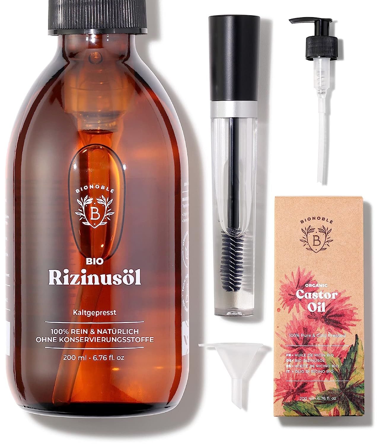 Braune Glasflasche mit Pumpe, Mascara-Kit, Trichter und Karton. Beschriftung: Rizinusöl, BIO, kaltgepresst.