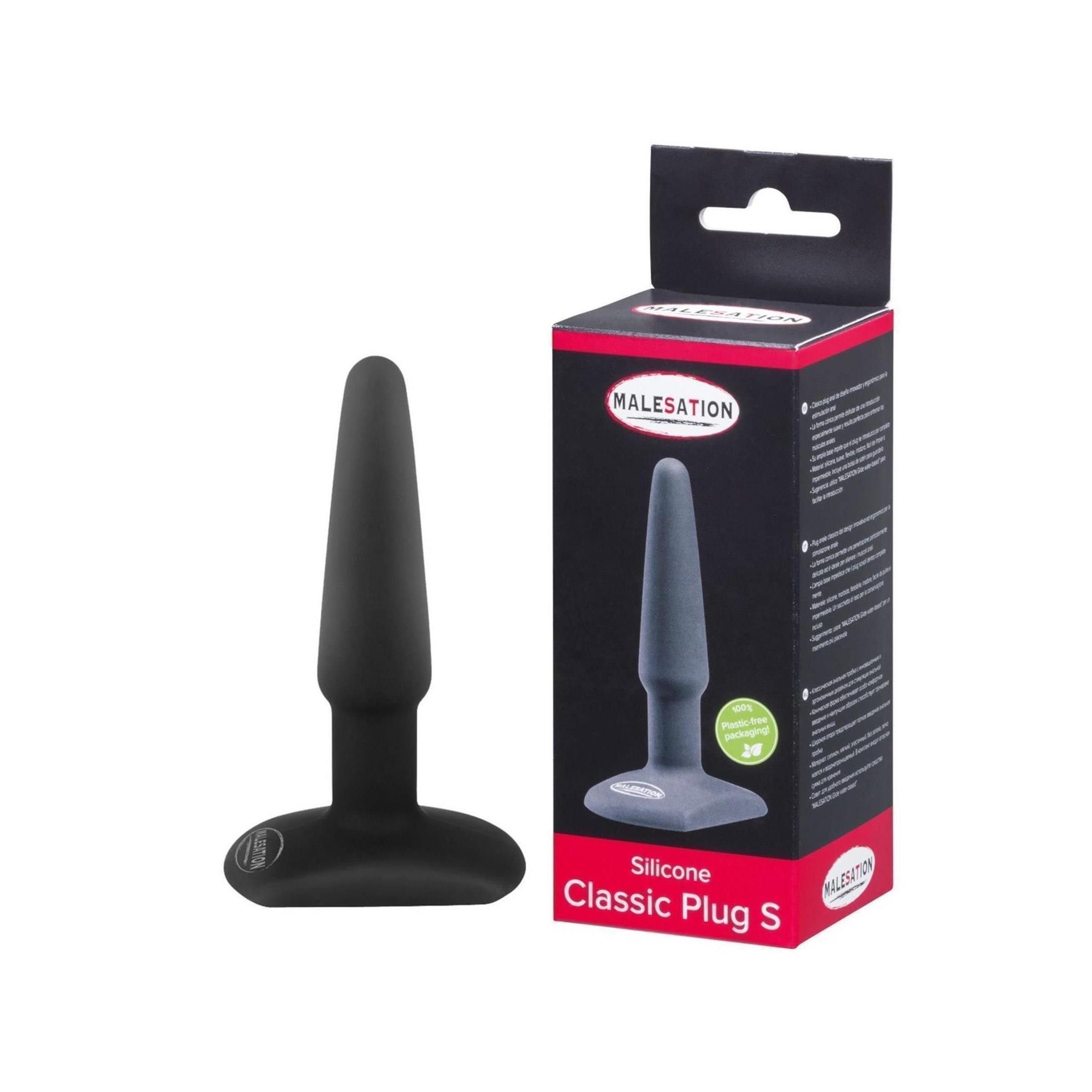 Schwarzer Silikon-Plug mit breiter Basis, neben seiner Verpackung. Die Verpackung zeigt einen grauen Plug und den Produktnamen.