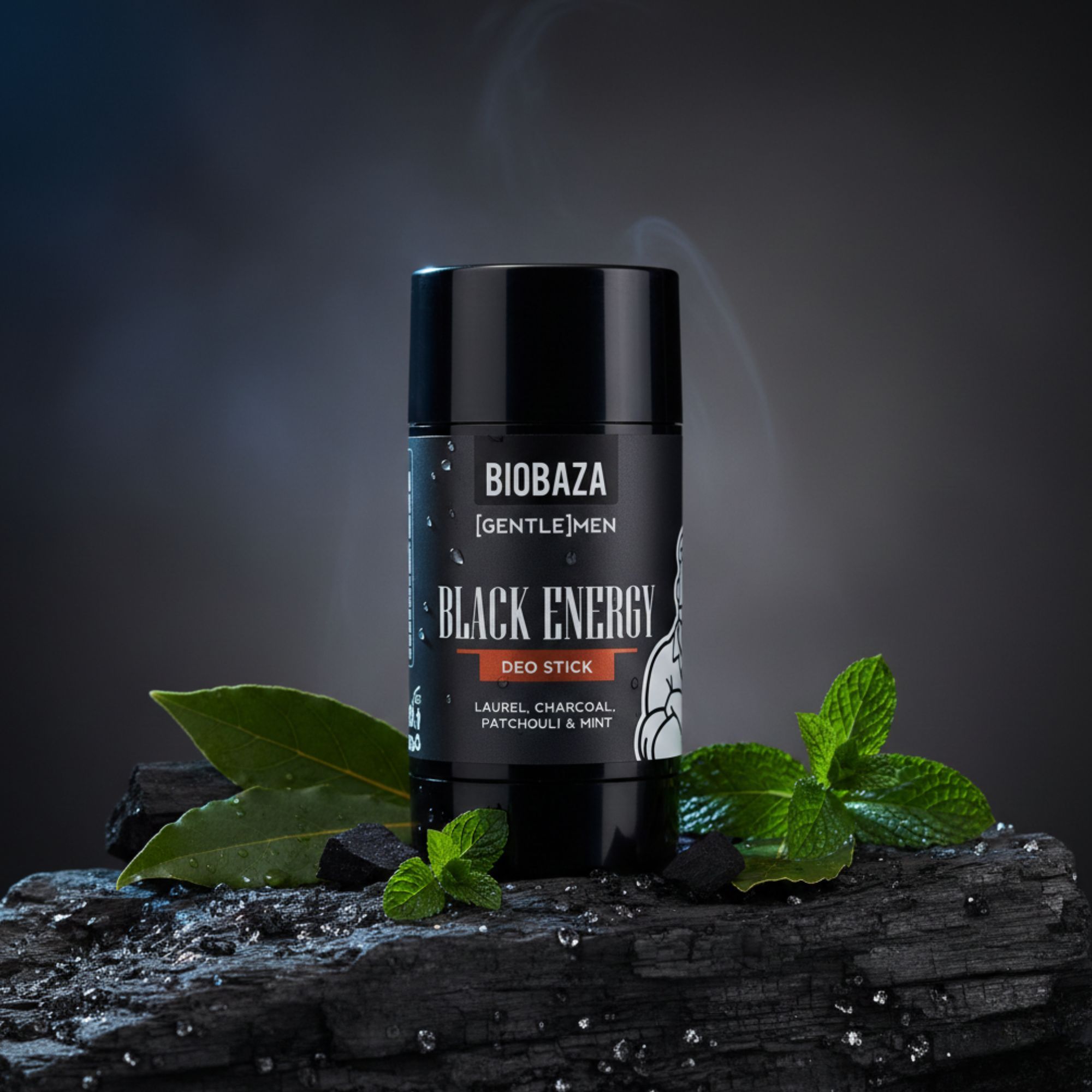Schwarzer Deo-Stick auf einem Stein, umgeben von Blättern. Aufschrift: Black Energy, Biobaza.