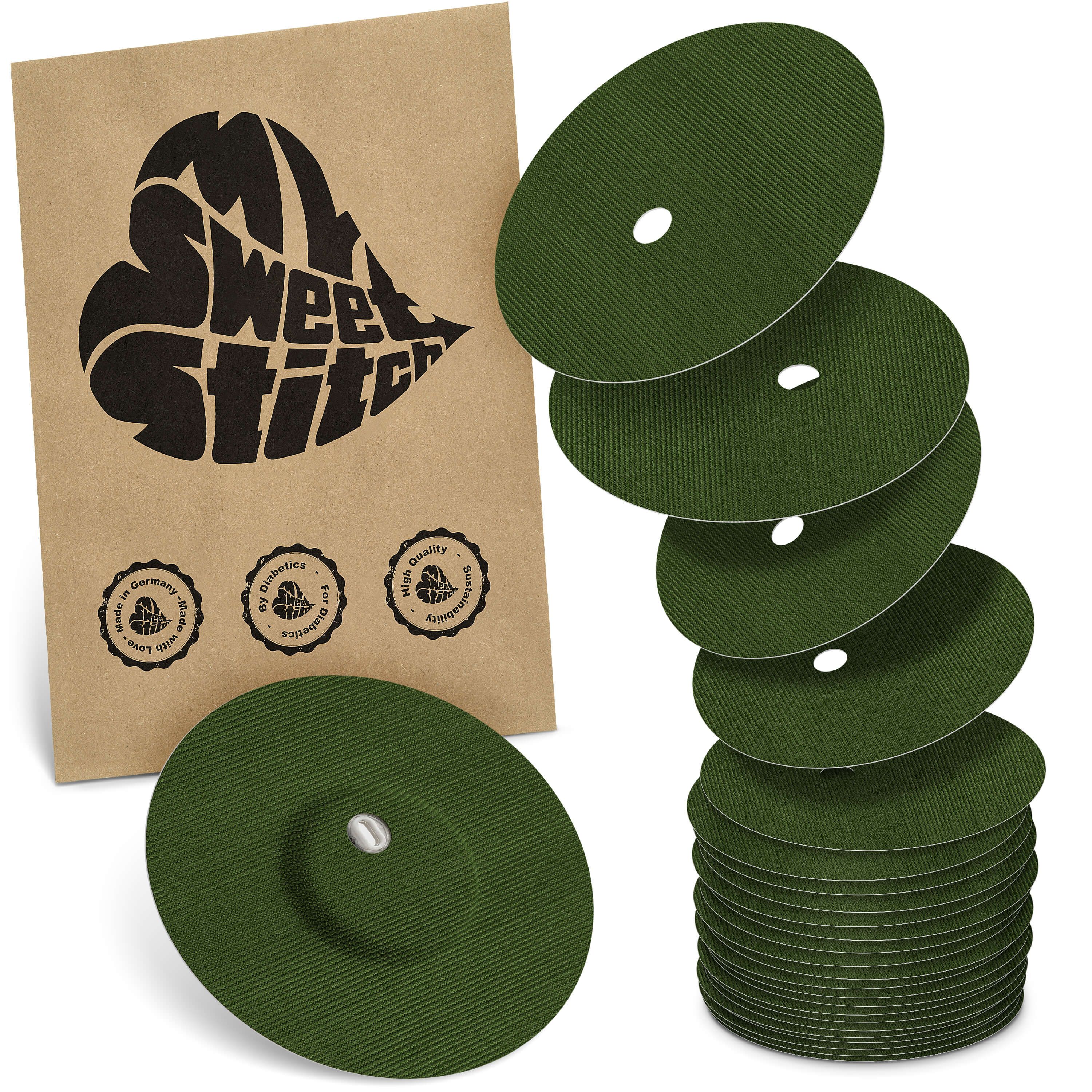 Runde, grüne Pflaster mit Loch. Verpackung mit Logo "MySweetStitch". Siegel: "Made in Germany".