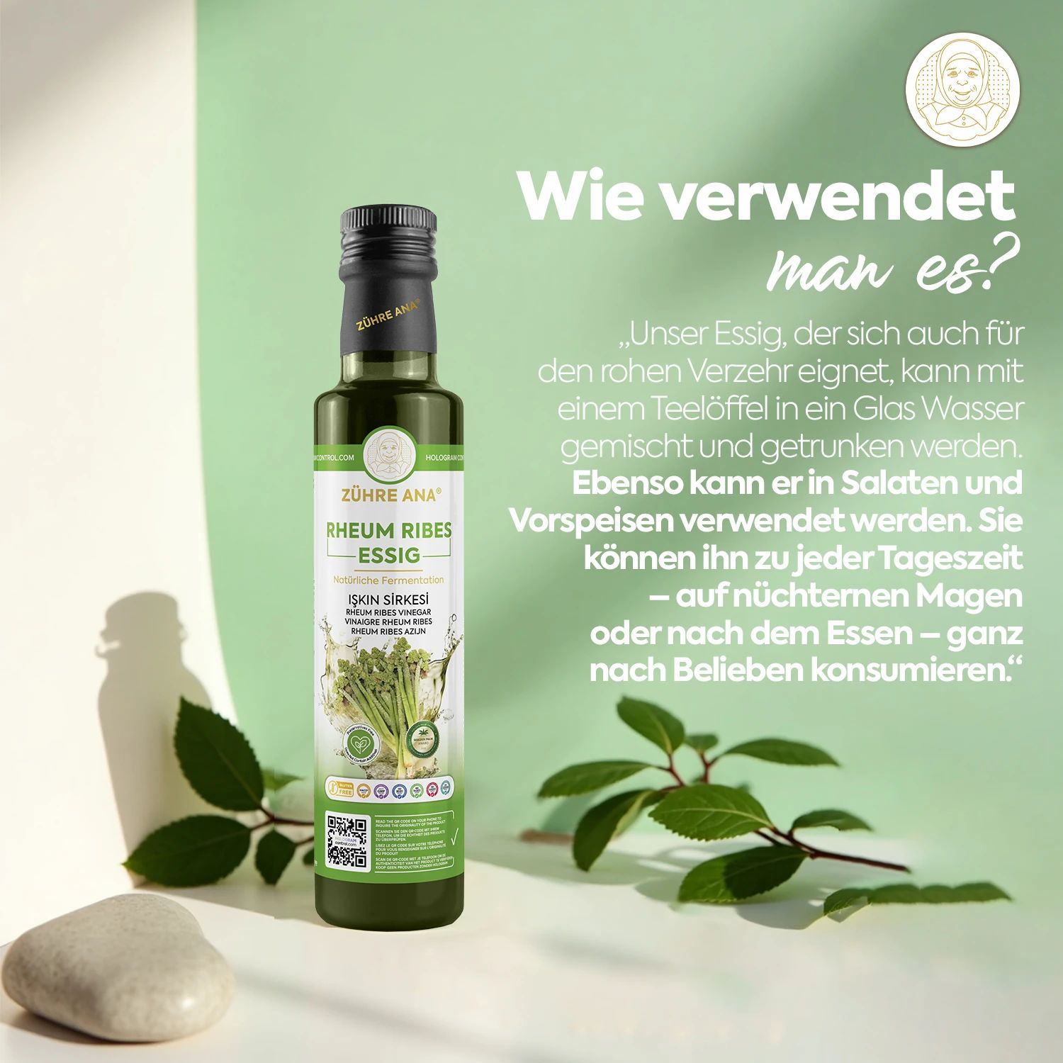 Flasche Zühre Ana Rheum Ribes Essig neben grünen Blättern und einem Stein. Text auf Deutsch: "Wie verwendet man es?"