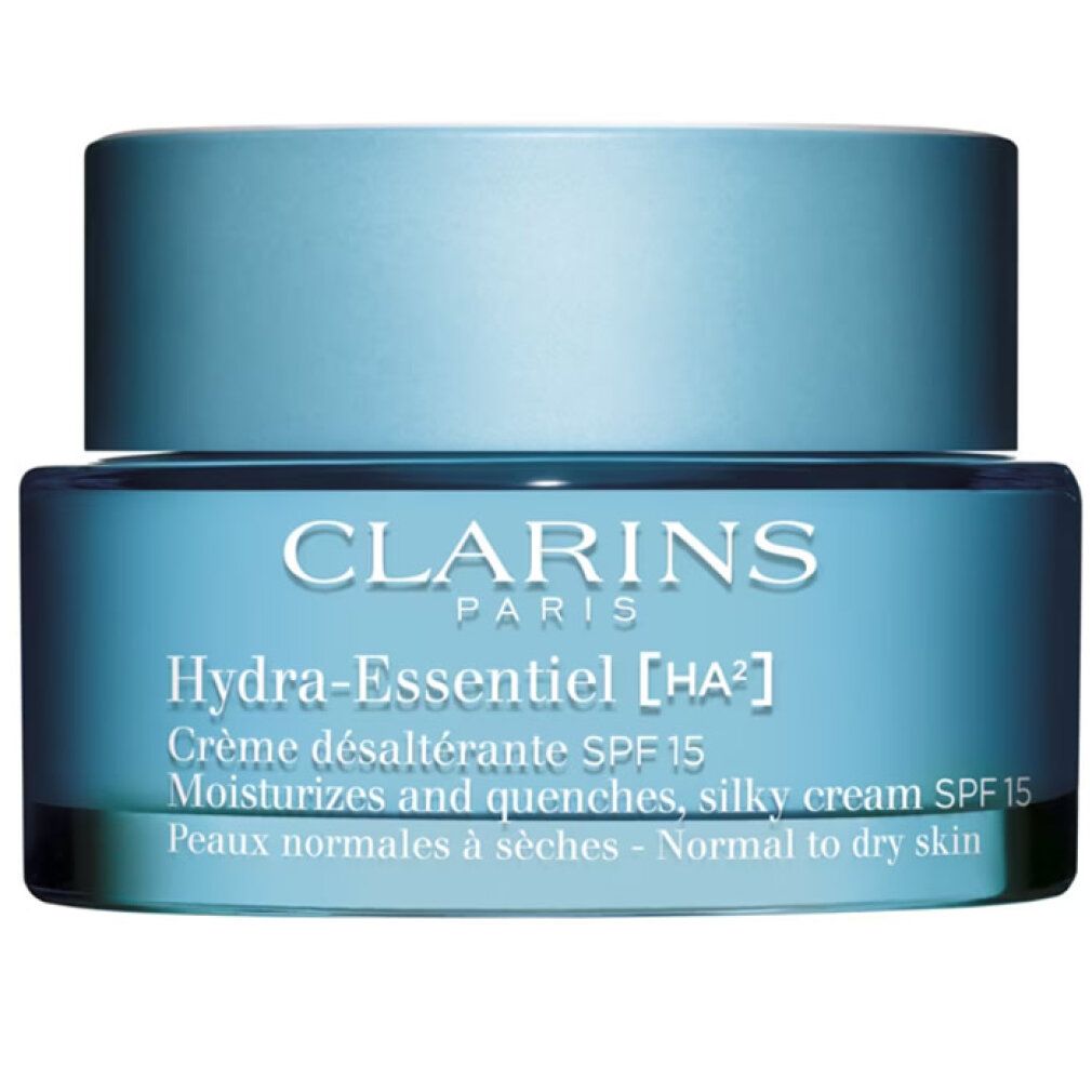 Blaues Tiegel mit Deckel. Aufschrift: Clarins Paris, Hydra-Essentiel, Crème désaltérante SPF 15. Für normale bis trockene Haut.