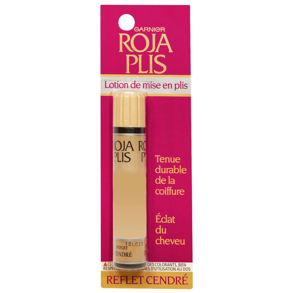Stylinglotion in einer länglichen Flasche mit gelbem Deckel. Auf der Verpackung steht "ROJA PLIS" und "REFLET CENDRÉ".
