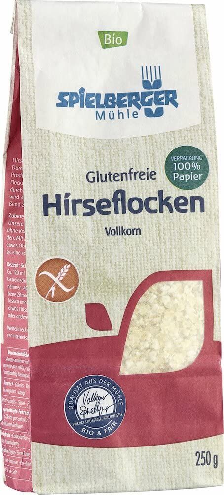Vorderseite einer Packung Spielberger Mühle glutenfreier Hirseflocken Vollkorn mit detaillierten Informationen und Bio-Siegel.