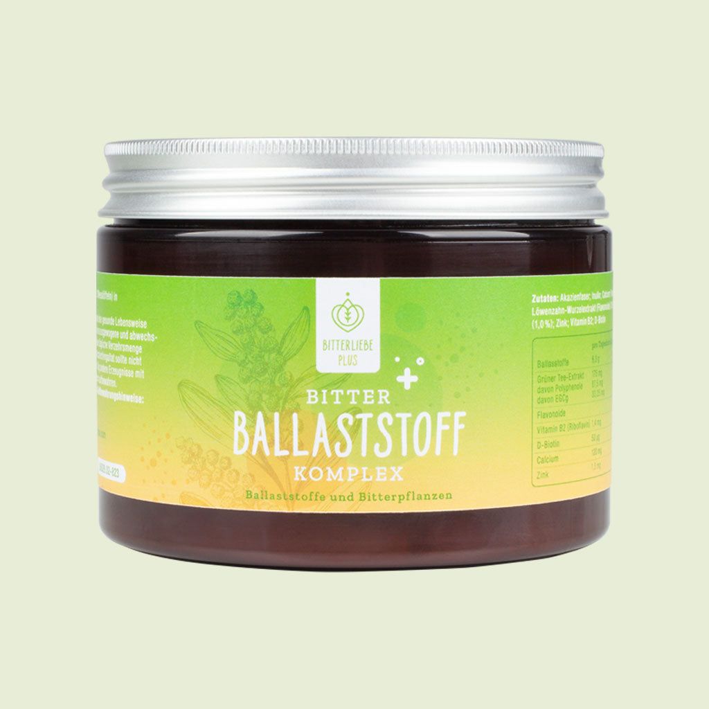 Braune Dose mit silbernem Deckel, gelb-grünes Etikett. Text: BitterLiebe Ballaststoff Komplex. Auf grünem Hintergrund.
