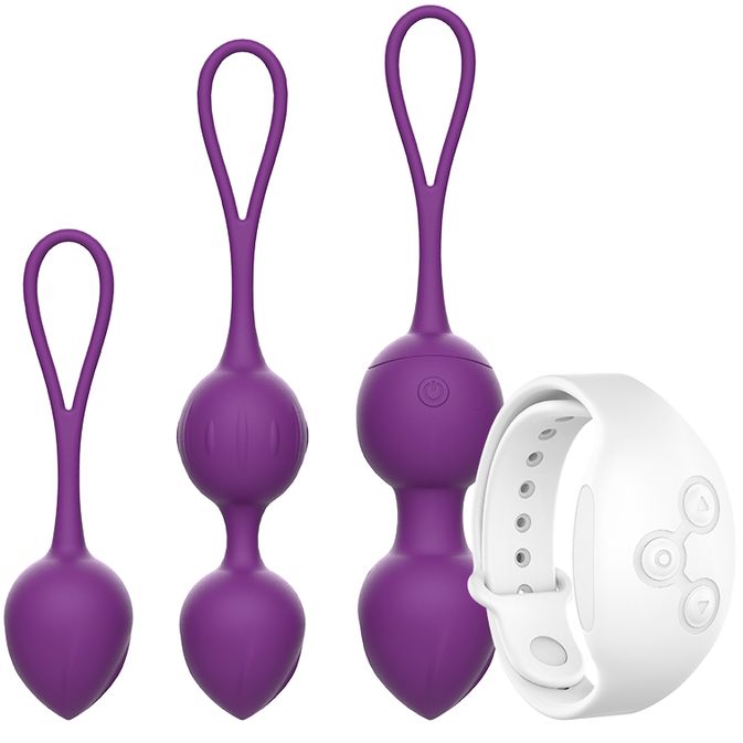 Drei lila Vibro-Bälle mit Schlaufen und eine weiße Fernbedienung. Ein Ball hat einen Ein-/Ausschalter.