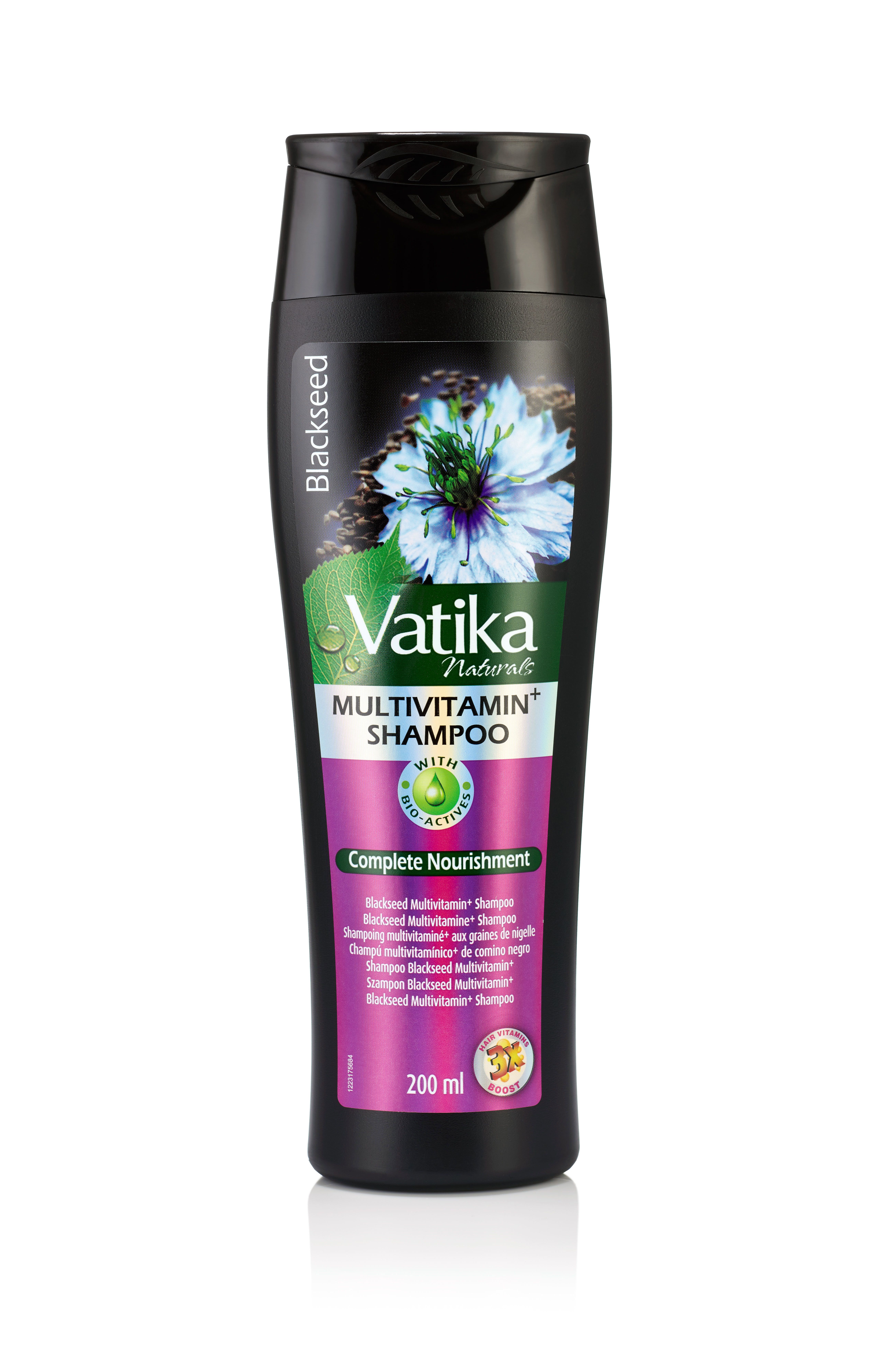 Schwarze Shampoo-Flasche mit "Vatika Naturals" und "Multivitamin+" Schriftzug. Schwarzkümmel-Blüten-Illustration. 200 ml.