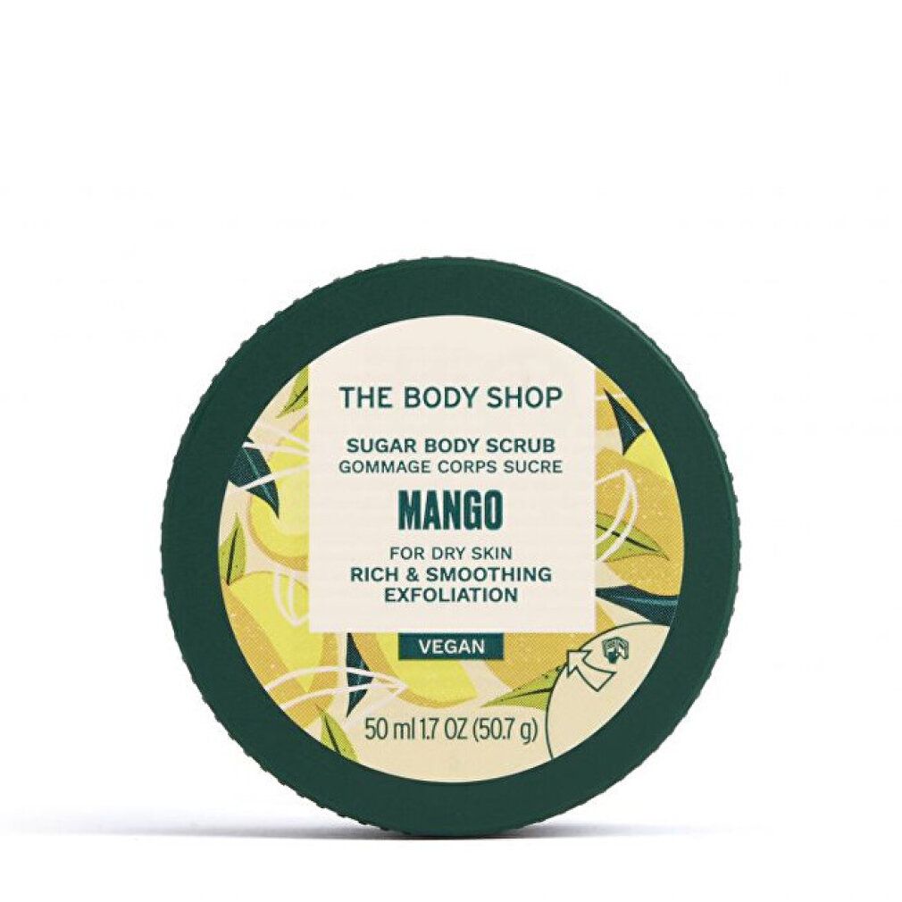 Runder, grüner Behälter mit weißem Etikett. Aufschrift: Mango Sugar Body Scrub. Vegan. 50 ml.