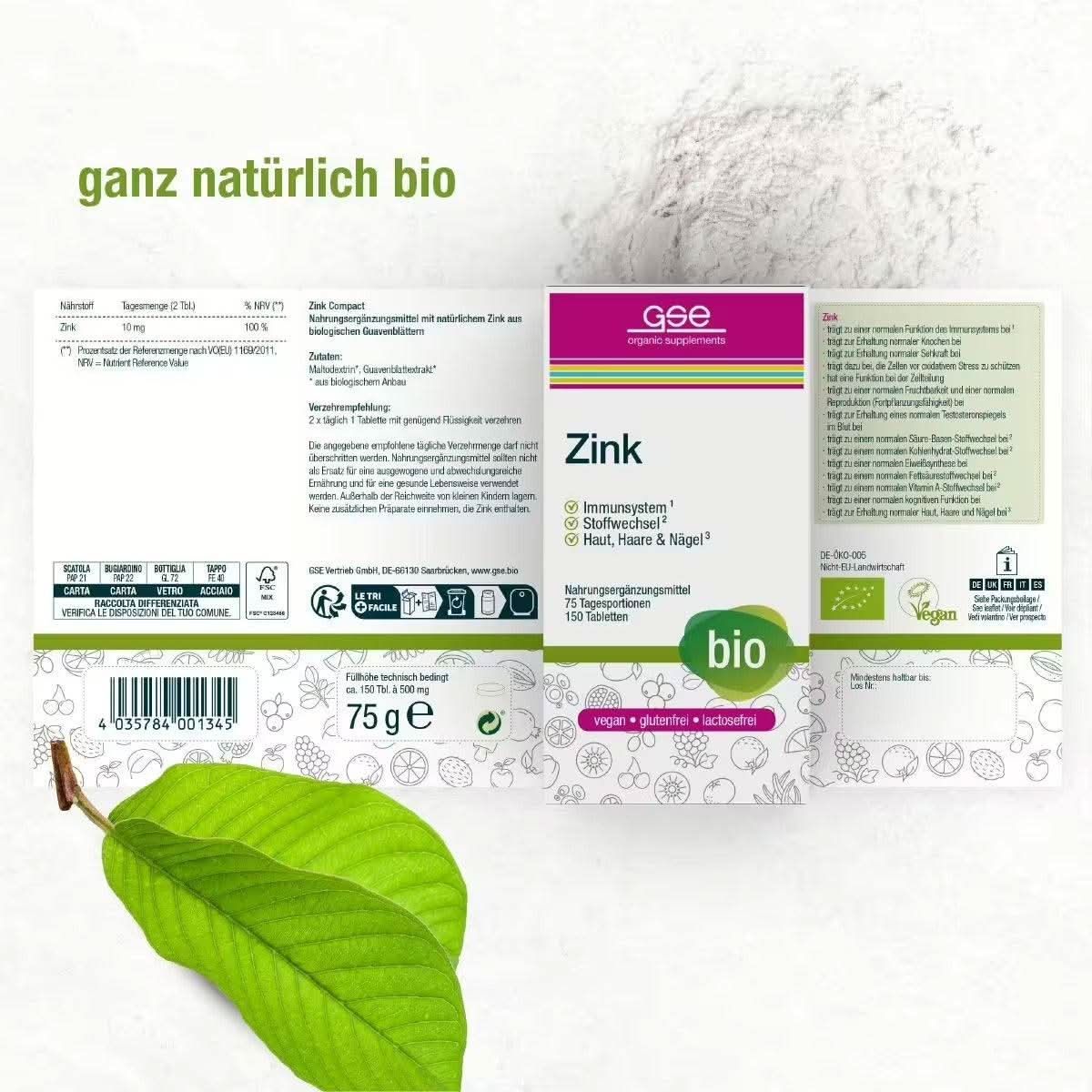 Geöffnete Verpackung "Zink". Text: 75 g, 150 Tabletten. "bio"-Siegel. Vegan, glutenfrei, laktosefrei. Blätter und Pulver im Hintergrund.