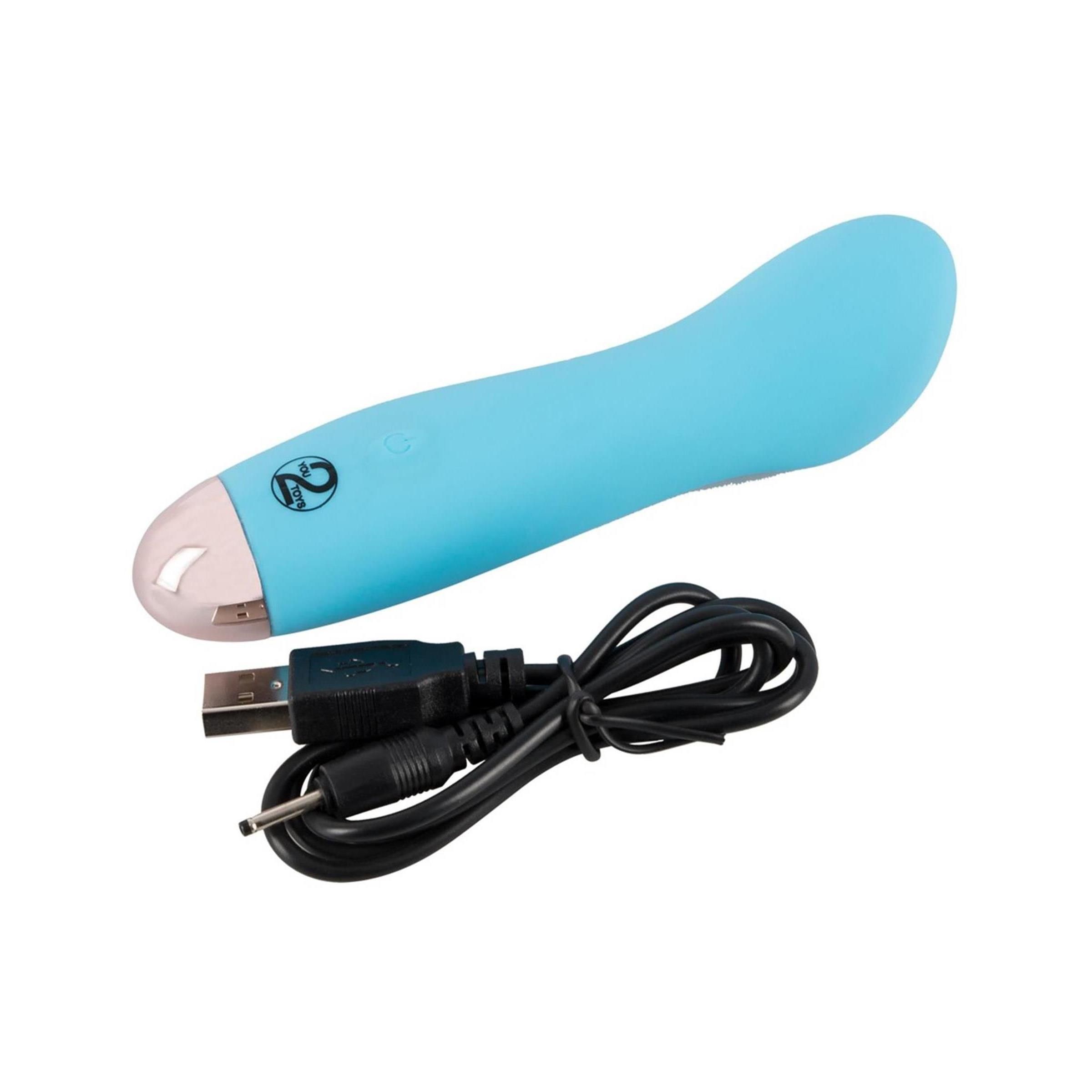 Blauer Vibrator mit USB-Kabel. Rosa Spitze.