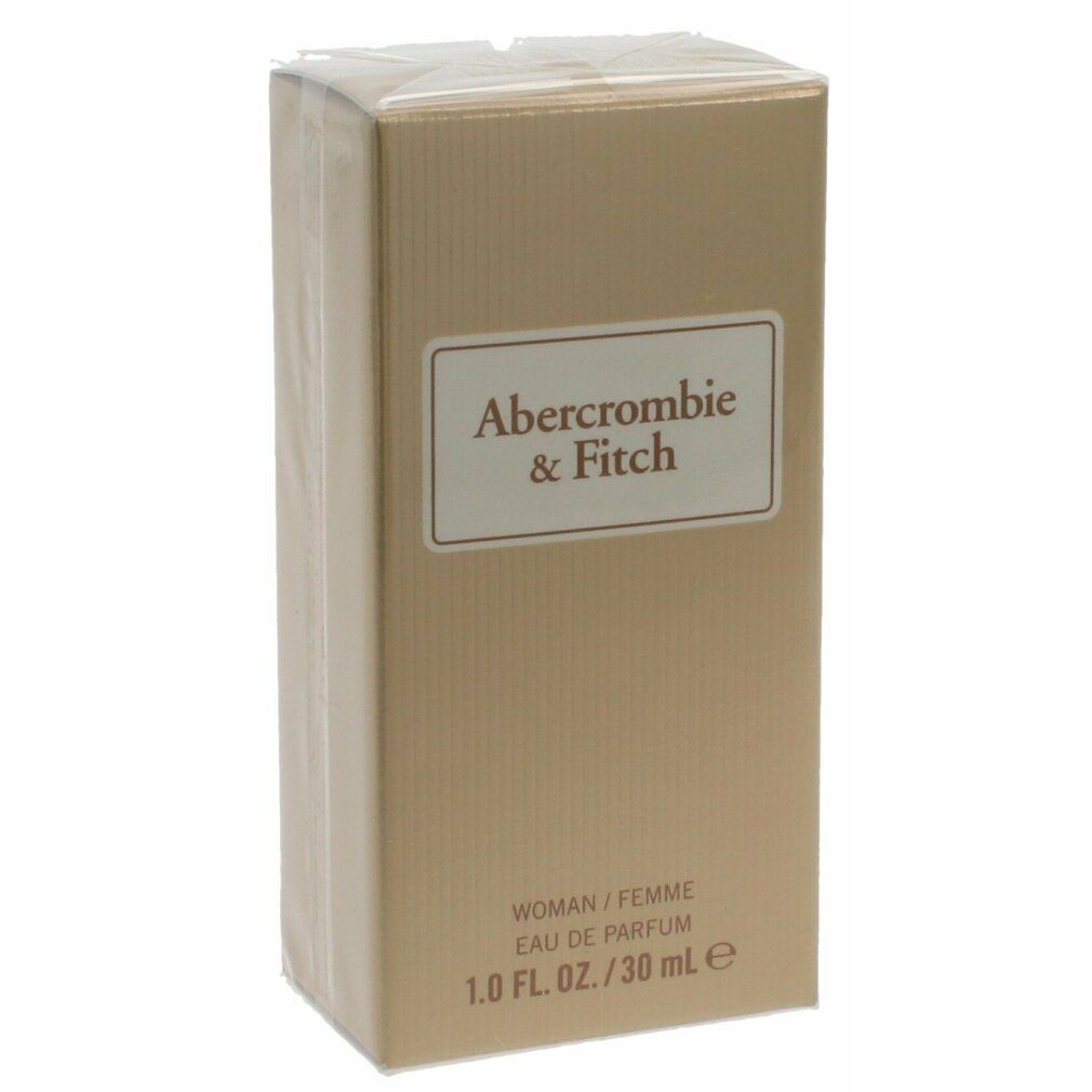 Karton mit Produktverpackung. Auf dem Etikett steht "Abercrombie & Fitch". Auf dem Karton steht "WOMAN / FEMME".