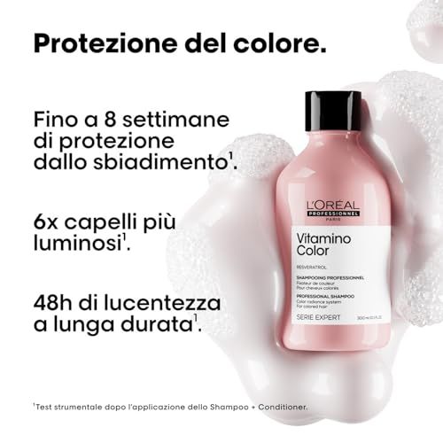 L'Oréal Professionnel Vitamino Color Shampoo Flasche umgeben von Schaum, mit Text über Farbschutz.