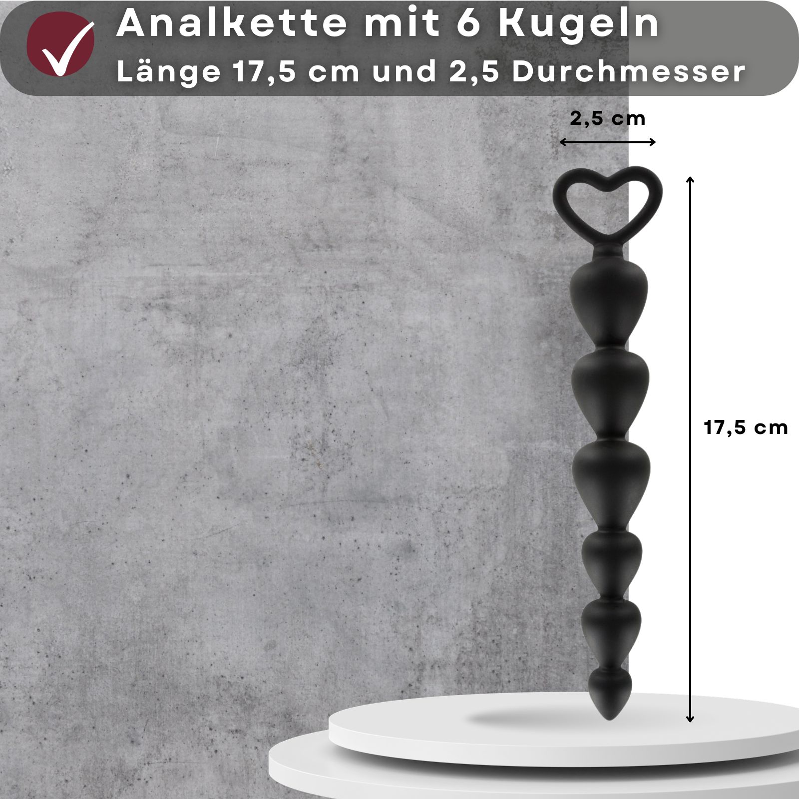 Schwarze Analperlenkette mit 6 Kugeln und Herzgriff. 17,5cm lang, 2,5cm Durchmesser. Text: Anal Kette mit 6 Kugeln.