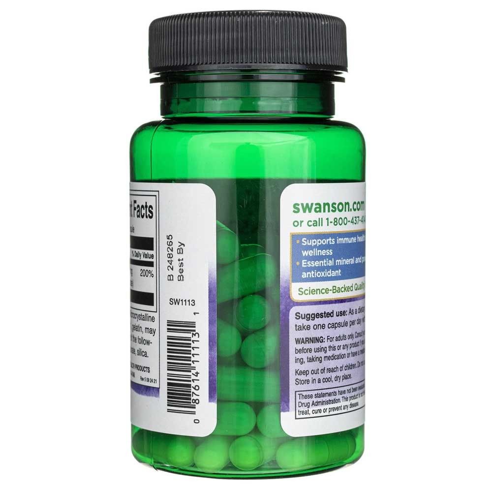 Grüne Kunststoffflasche mit schwarzem Deckel, gefüllt mit grünen Kapseln. Etiketten mit Nährwertangaben und Produktinformationen.