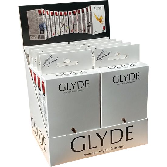 Verkaufsdisplay mit Schachteln. Aufdruck: GLYDE, Premium Vegan Condoms. Oben: Einzelpackungen. Aufschrift: The Original.