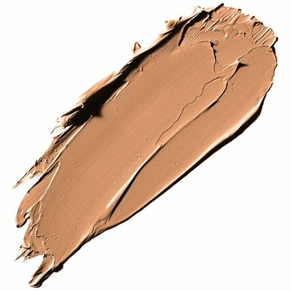 Beige Make-up-Strich auf weißem Hintergrund. Textur mit sichtbaren Pinselstrichen. Helle, neutrale Farbe.