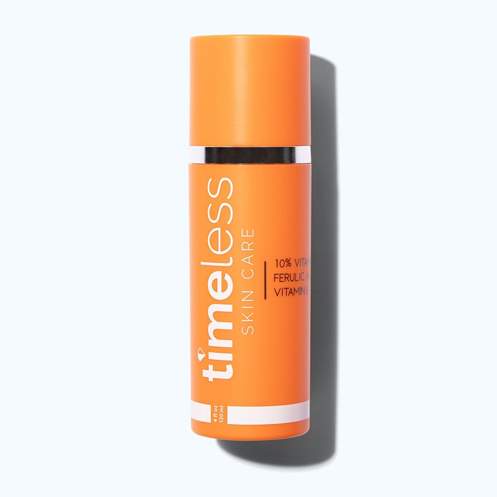 Orangefarbene Flasche mit silbernem Ring. Aufschrift: Timeless Skin Care, 10% Vitamin C, Ferulasäure, Vitamin E.