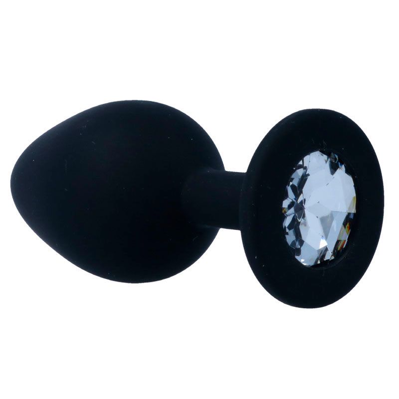 Schwarzer Butt-Plug aus Silikon mit einem facettierten Kristall-Aufsatz am Flansch.