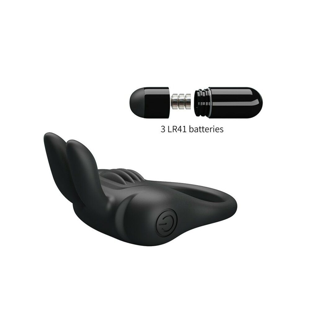 Schwarzer Penisring mit Hasenohren und Vibrator. Vibrator zerlegt, Batterien sichtbar.