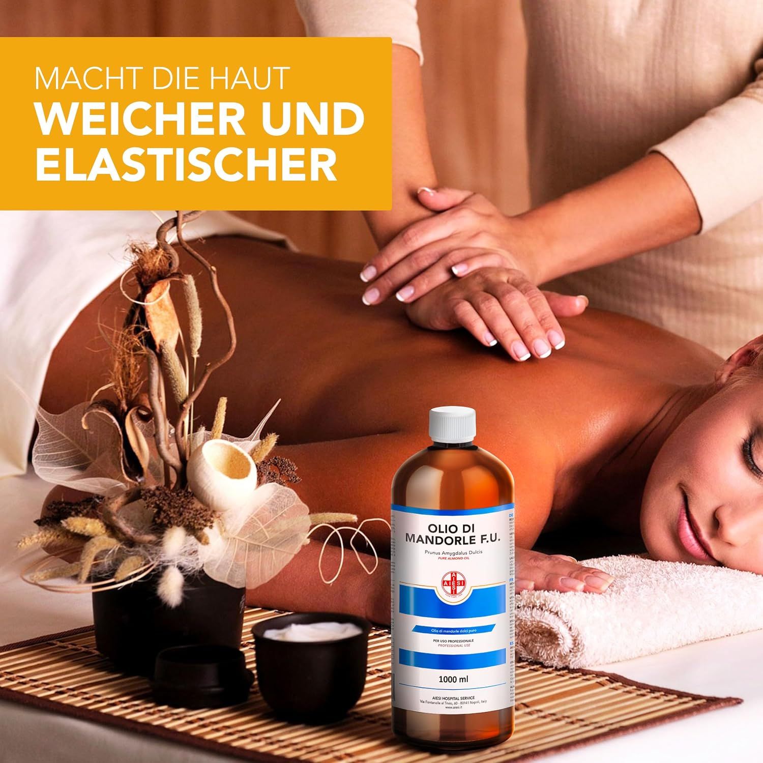Massage einer Person mit Mandelöl F.U. 1000ml Flasche auf einem Tisch.