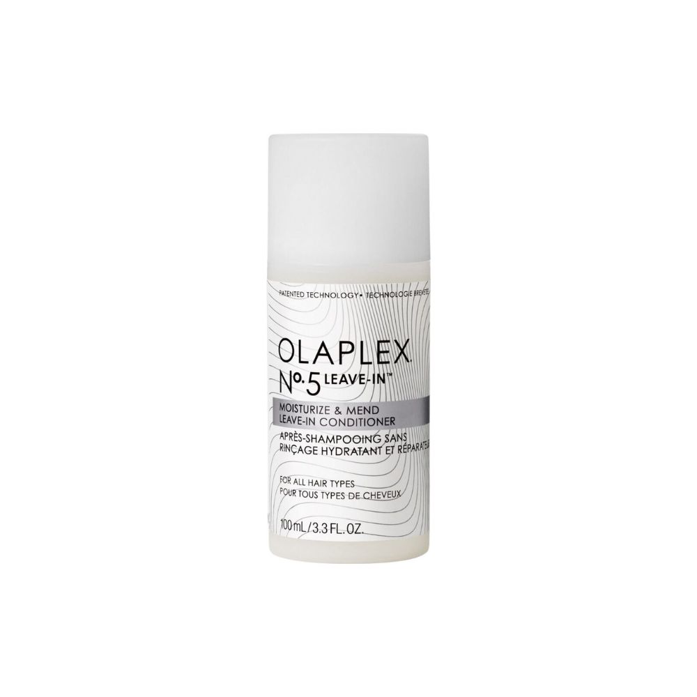 Weiße Flasche mit Olaplex No.5 Leave-In Conditioner. Text: Moisturize & Mend, Après-shampooing sans rinçage. Für alle Haartypen.