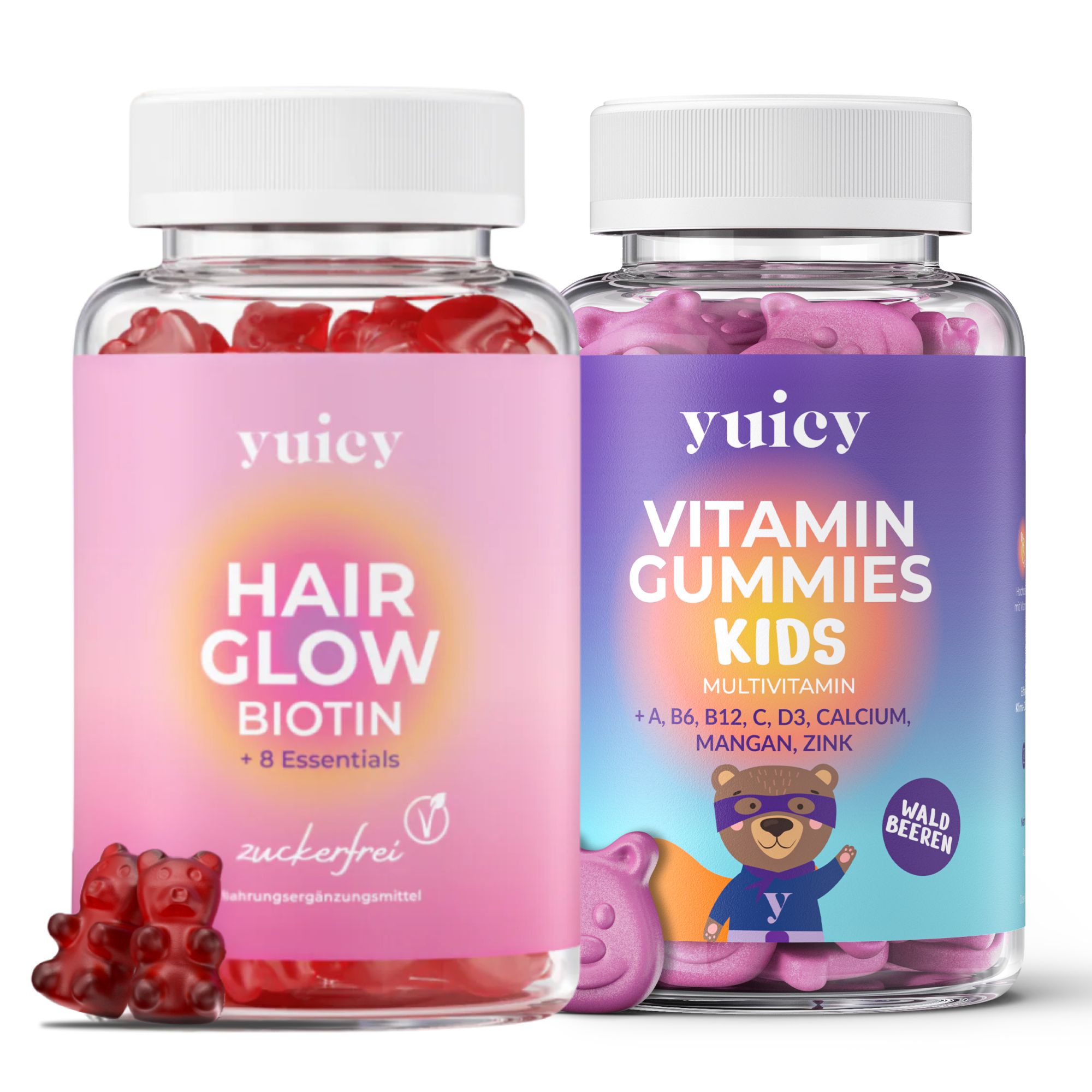 Zwei Flaschen yuicy® Hair Glow & Kids Multivitamin. Hair Glow: rosa Etikett, Biotin. Kids: lila Etikett, Vitamin Gummies. Beide mit Gummibärchen.