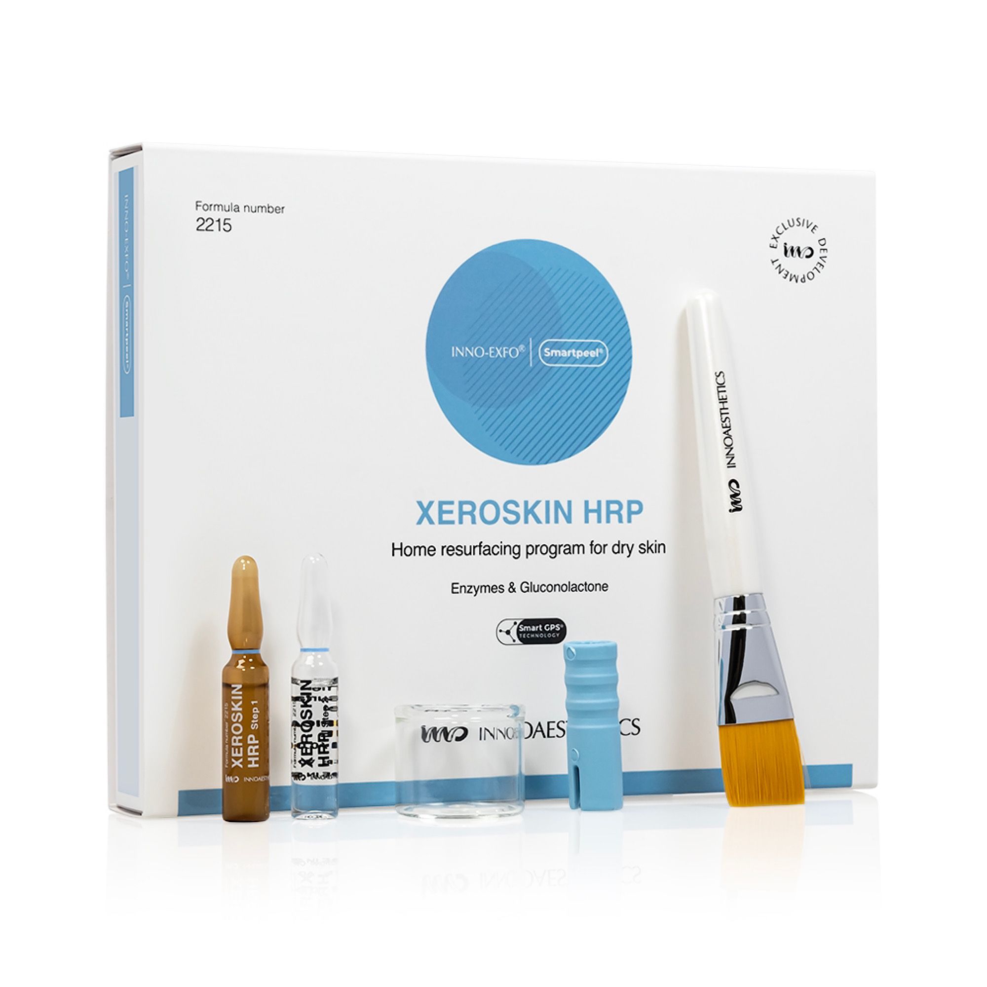 Produktverpackung mit Ampullen, Pinsel und Zubehör. Aufschrift: Xeroskin HRP, Home resurfacing program for dry skin.