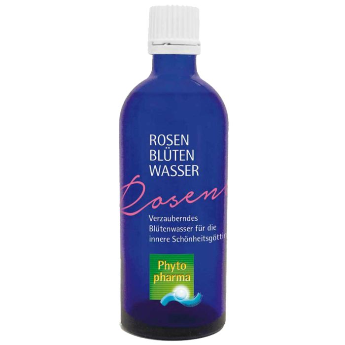 Blaue Glasflasche mit weißem Verschluss. Aufschrift: Rosen Blüten Wasser, darunter "Rosen" in rosa Schrift. Logo: Phyto pharma.