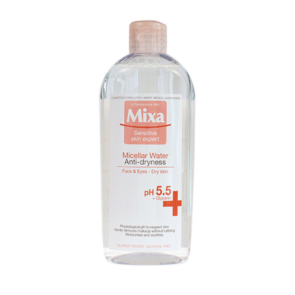 Klare Flasche mit rosa Verschluss. Etikett mit "Mixa", "Micellar Water Anti-dryness", pH 5.5 und Inhaltsstoffen.