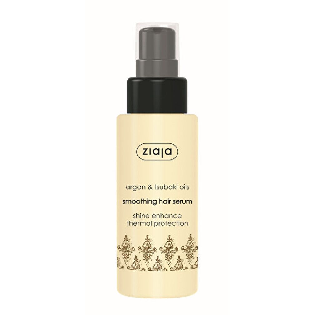 Beige Flasche mit schwarzem Sprühkopf. Aufschrift: ZIAJA, Argan & Tsubaki Öle, Smoothing Hair Serum, Shine Enhance, Thermal Protection.