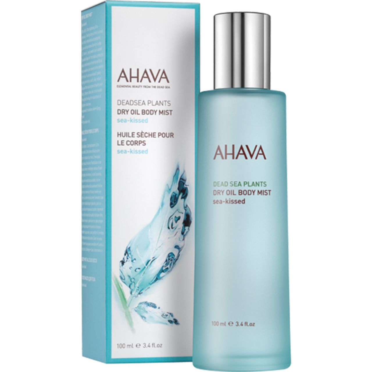 AHAVA Dry Oil Body Mist und Verpackung. Flasche mit silbernem Deckel, hellblau. Verpackung mit Logo und Produktbezeichnung.
