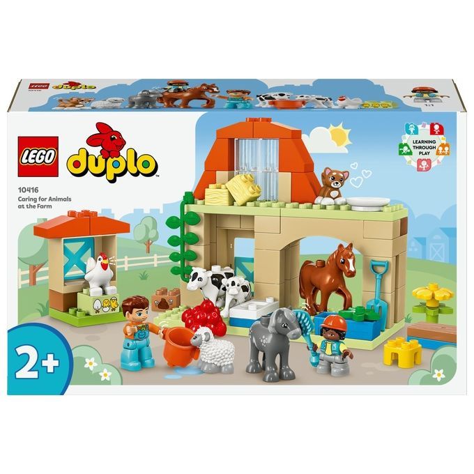 LEGO Duplo-Set. Bauernhof-Spielzeug mit Figuren und Tieren. Verpackung mit Produktname und Altersempfehlung 2+. Gebäude und Tiere.
