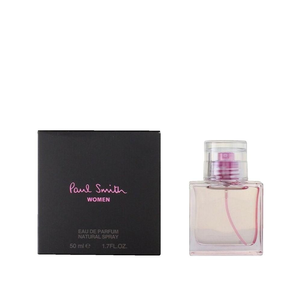 Flakon und Schachtel. Rechteckiger Glasflakon mit rosa Flüssigkeit und Sprühkopf. Schwarze Schachtel mit rosa Schriftzug: Paul Smith Women.