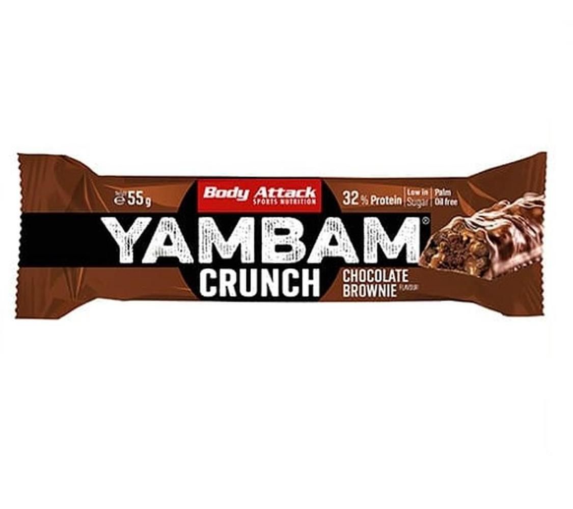 Verpackte YAMBAM CRUNCH Schokoriegel. Aufschrift: Body Attack, 32% Protein, 55g, Chocolate Brownie. Abbildung des Riegels.