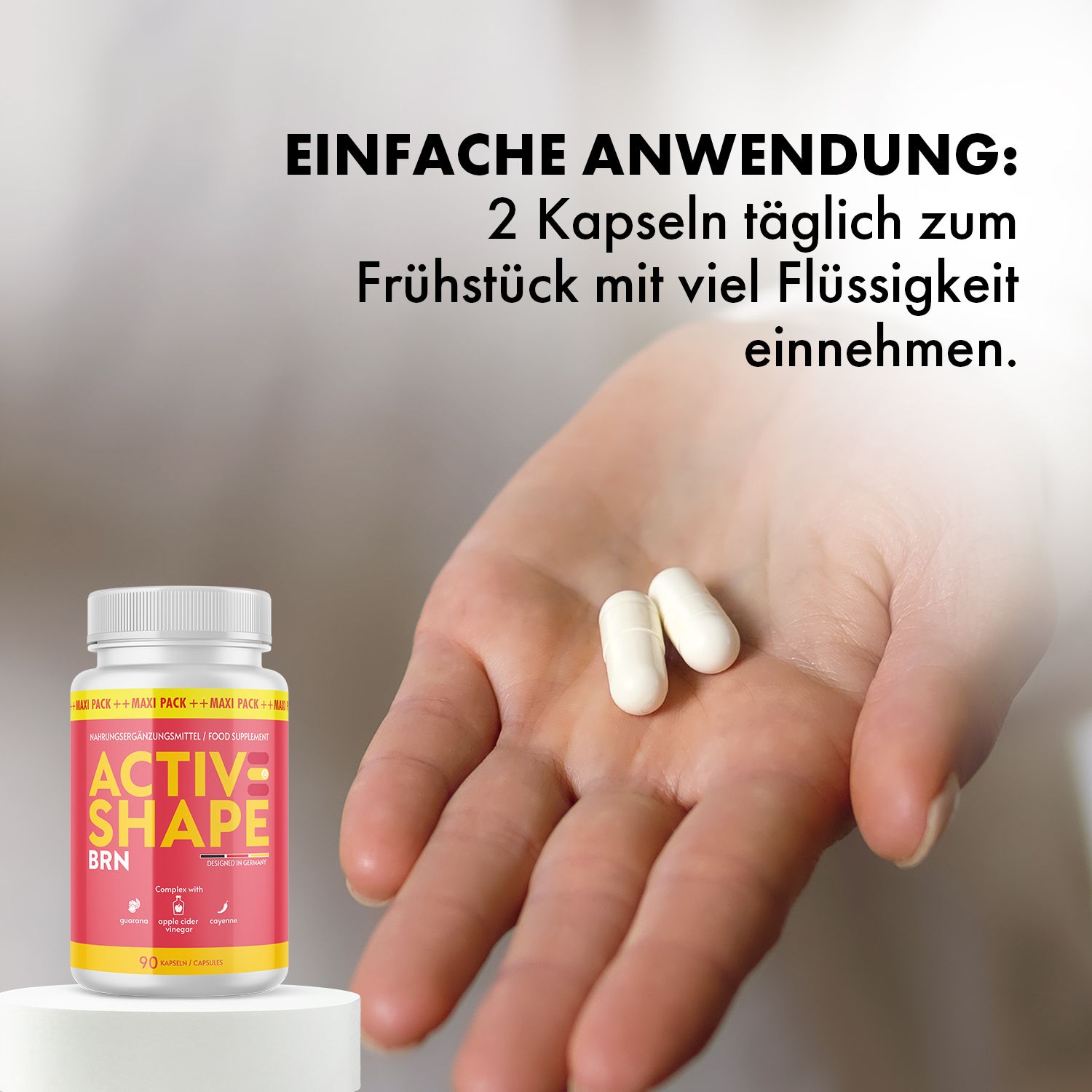 Hand hält zwei weiße Kapseln. Daneben eine Dose ACTIVESHAPE BRN. Text: 2 Kapseln täglich zum Frühstück mit viel Flüssigkeit einnehmen.