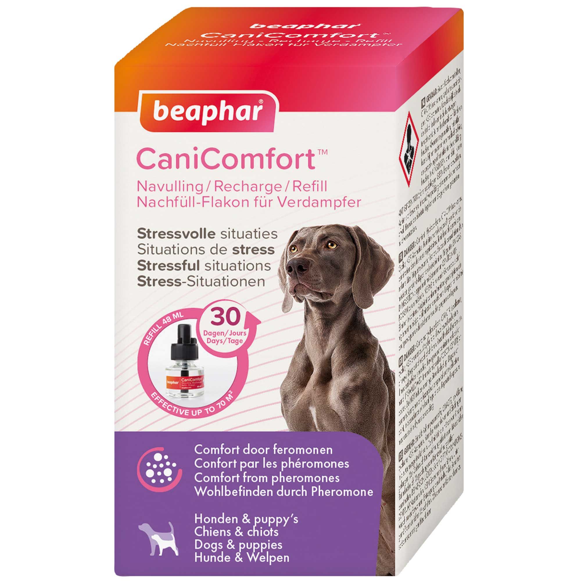 Verpackung mit Produktabbildung und Hund. Text: Beaphar CaniComfort, Nachfüll-Flakon für Verdampfer. Rosa, orange und weiße Elemente.