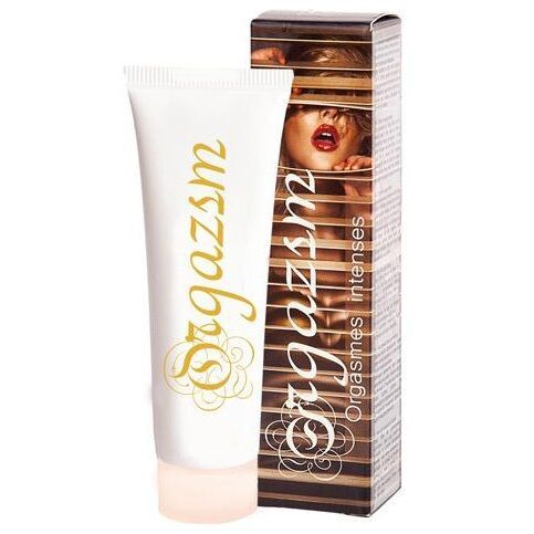 Creme-Tube und Verpackung. Tube weiß mit goldfarbenem Schriftzug. Verpackung braun mit Frauengesicht und Schriftzug.