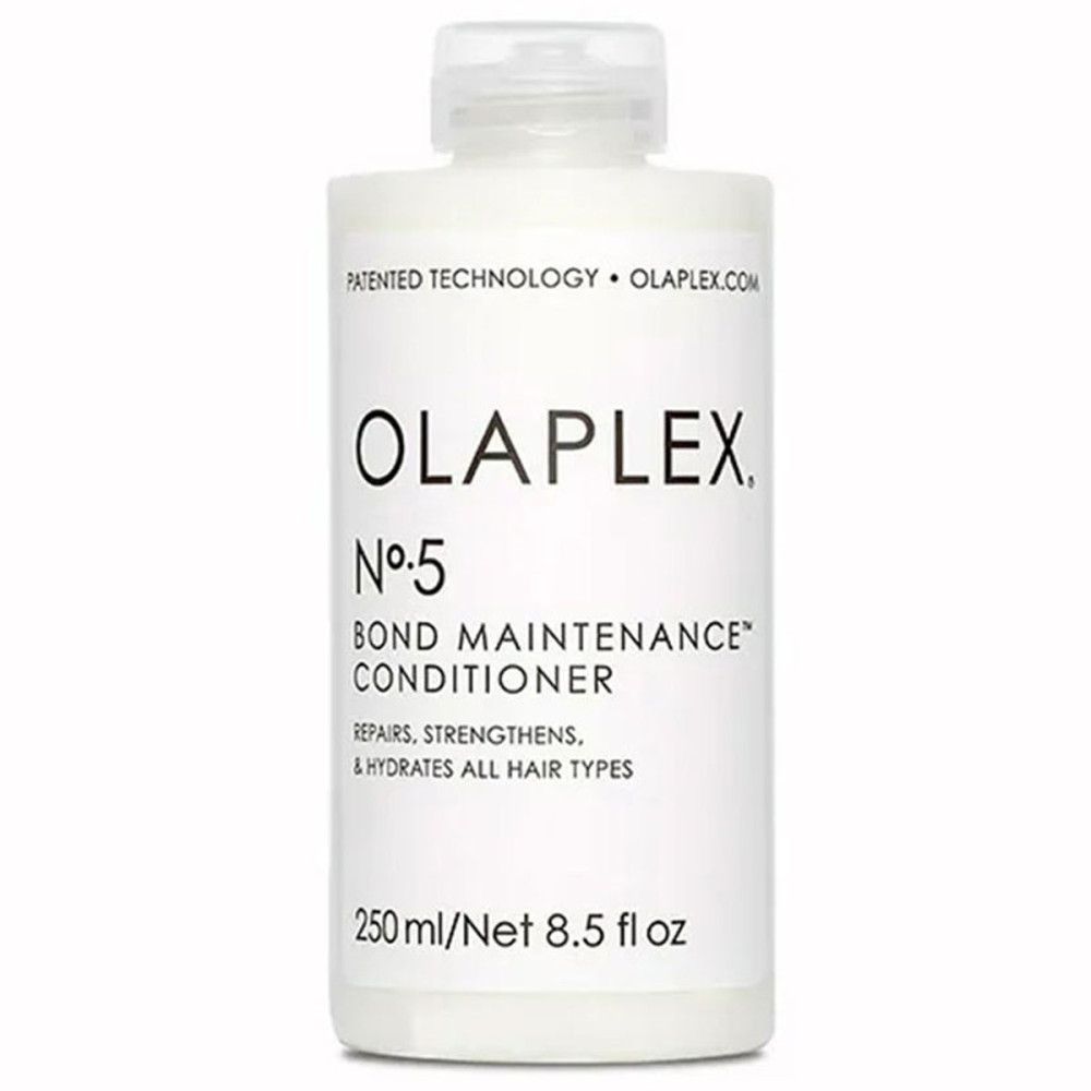 Weiße Flasche mit Olaplex Nº5 Bond Maintenance Conditioner-Etikett. Enthält 250 ml/8,5 fl oz. Repariert, stärkt und hydratisiert alle Haartypen.