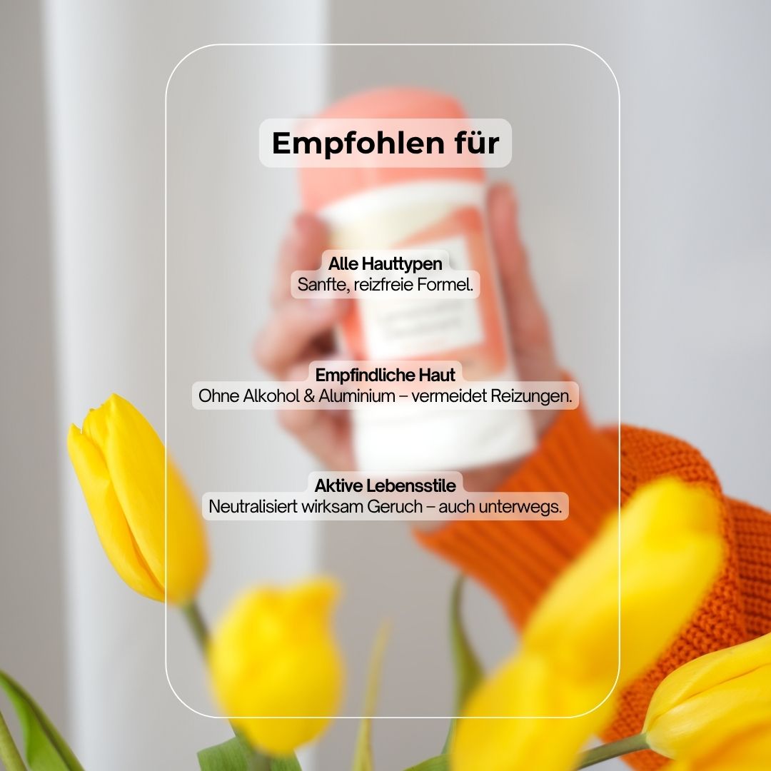 Hand hält Deodorant-Stick. Text: Empfohlen für: Alle Hauttypen, empfindliche Haut, aktive Lebensstile. Gelbe Tulpen.